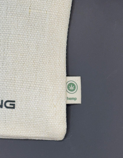 Hemp jump rope carry bag from Coming On Strong with the tag showing it is made of hemp.
