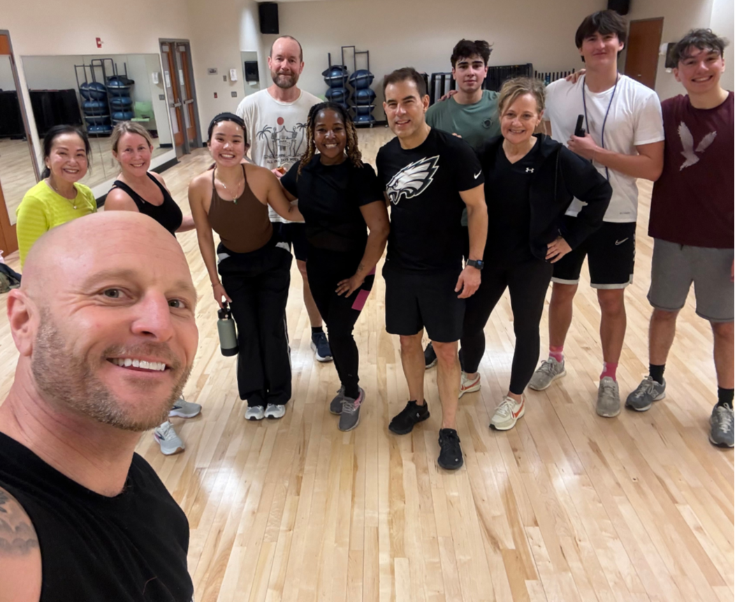 A happy picture of Start Strong jump rope students with Dan Bantell from Coming On Strong. 