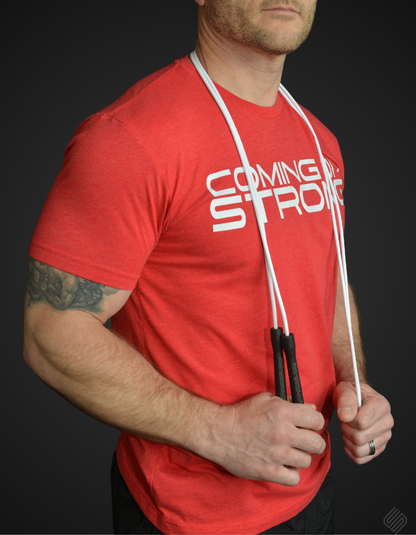 Dan Bantell with a white jump rope that has black handles from Coming On Strong.
